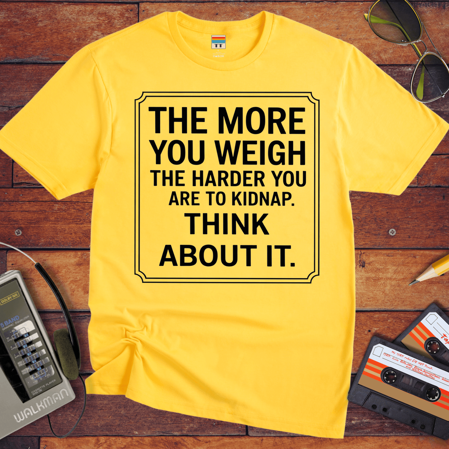 "The More you weigh, the harder you are to kidnap" T-Shirt