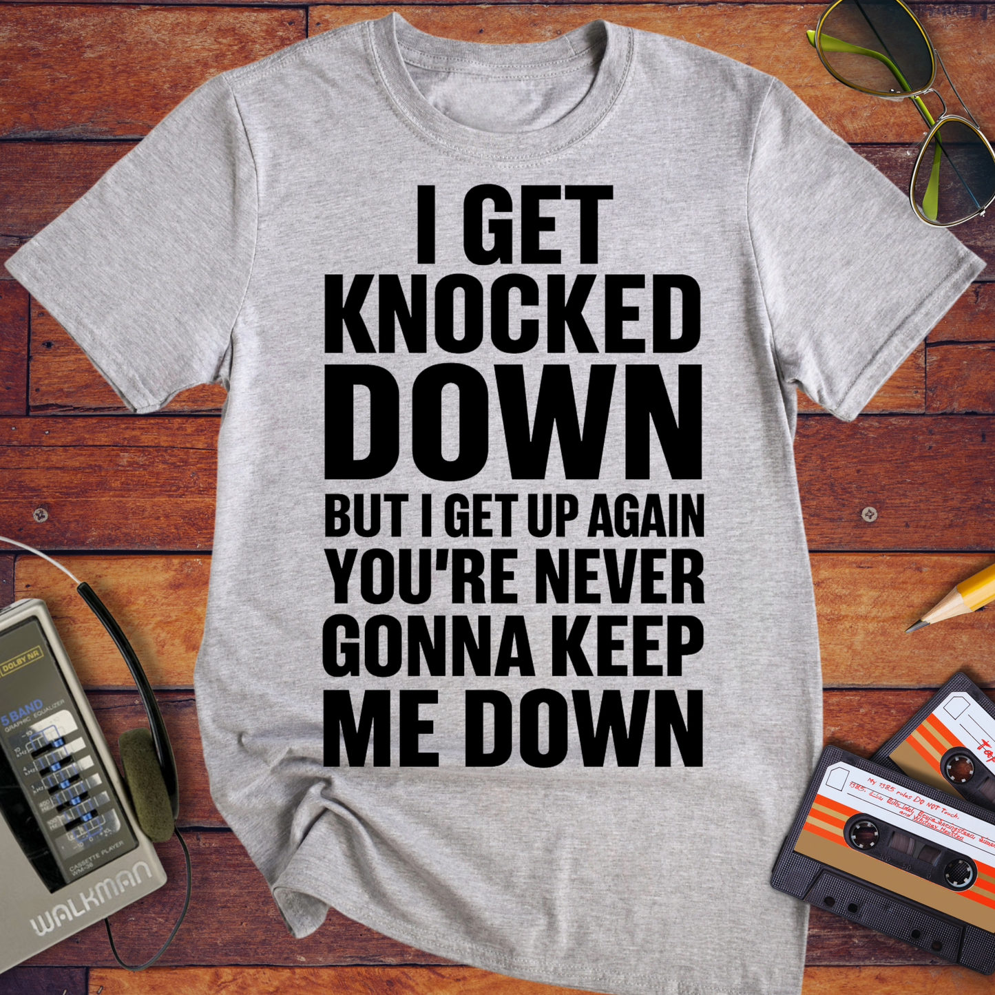 'I GET KNOCKED DOWN BUT I GET UP AGAIN YOU'RE NEVER GONNA KEEP ME DOWN' T-Shirt