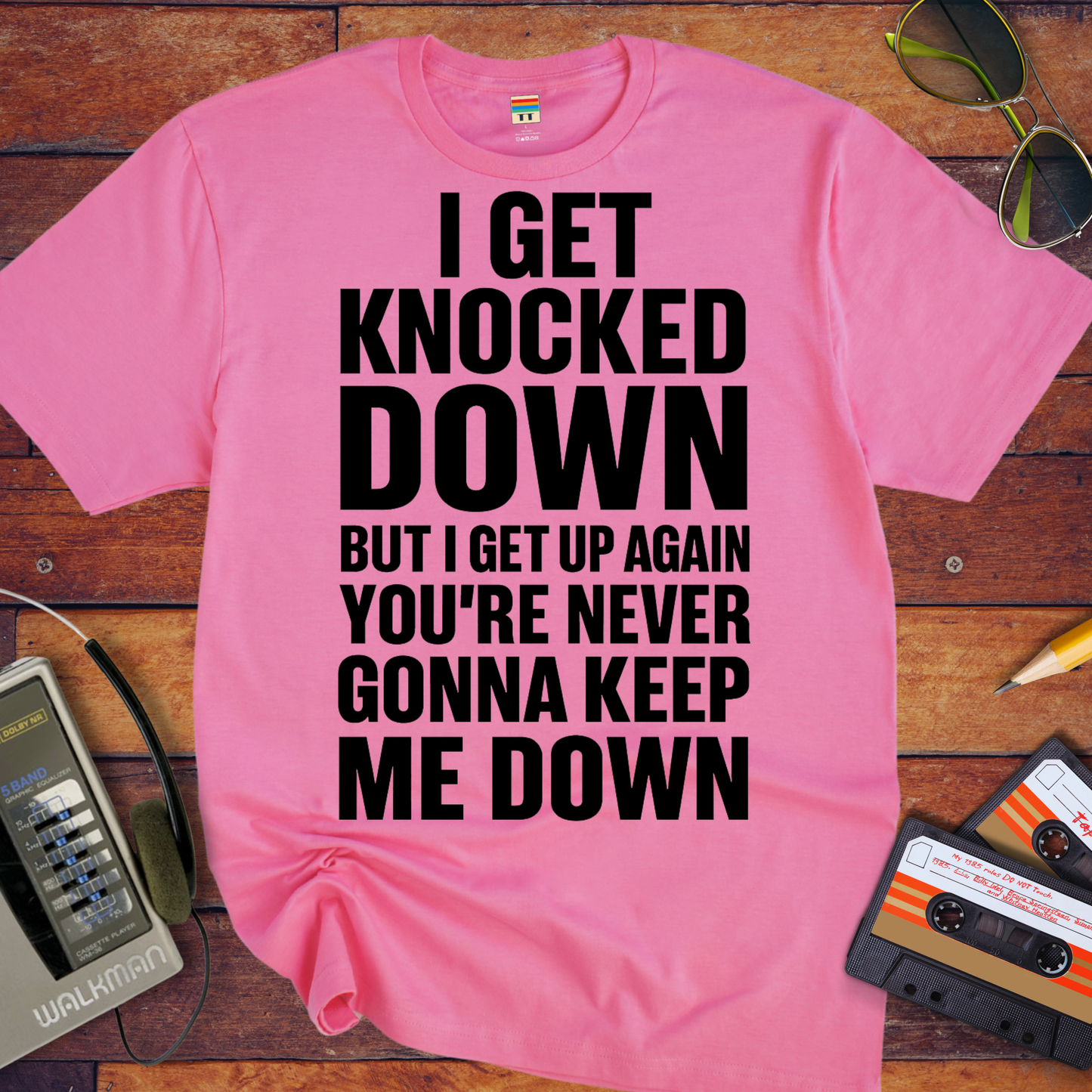 'I GET KNOCKED DOWN BUT I GET UP AGAIN YOU'RE NEVER GONNA KEEP ME DOWN' T-Shirt