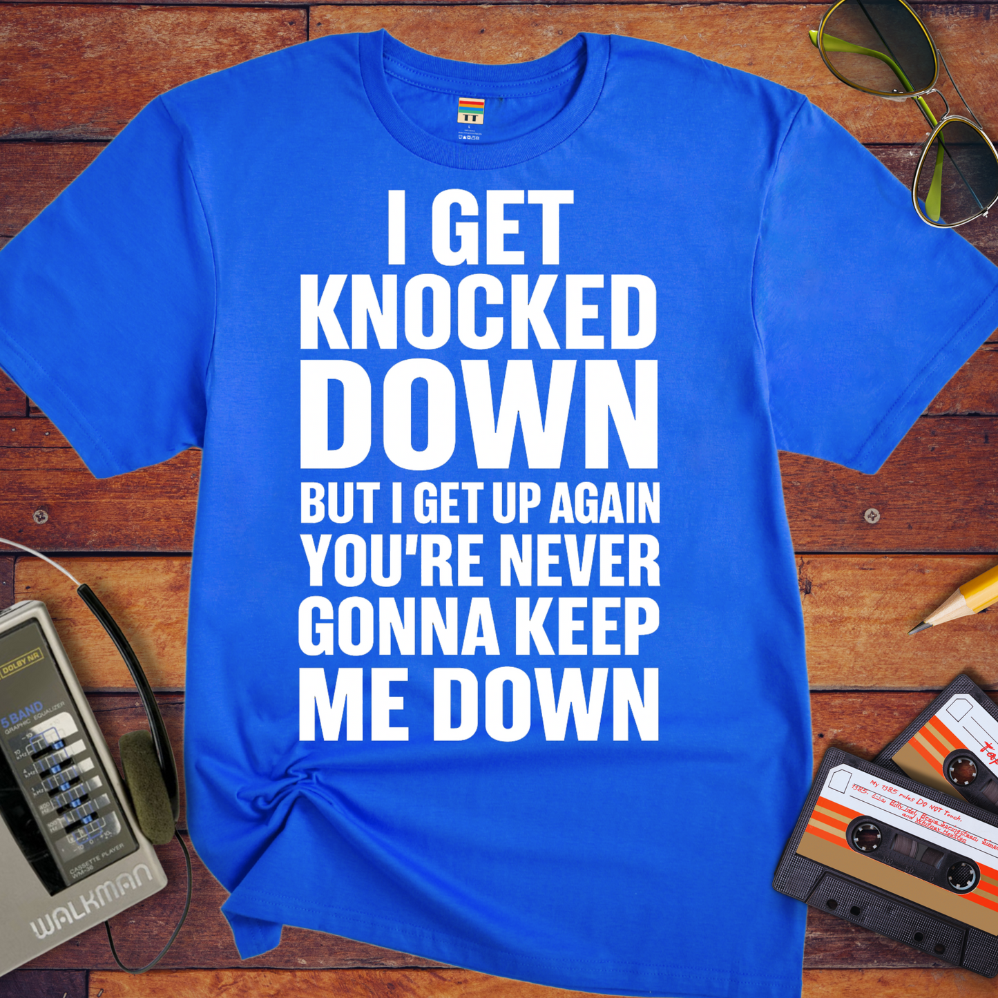 'I GET KNOCKED DOWN BUT I GET UP AGAIN YOU'RE NEVER GONNA KEEP ME DOWN' T-Shirt