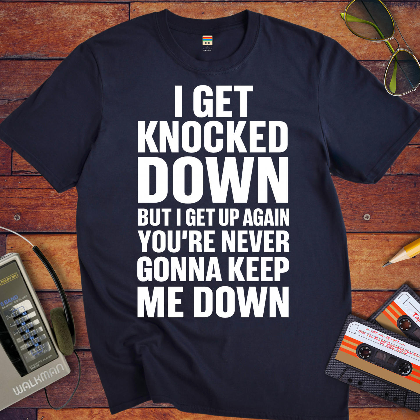 'I GET KNOCKED DOWN BUT I GET UP AGAIN YOU'RE NEVER GONNA KEEP ME DOWN' T-Shirt