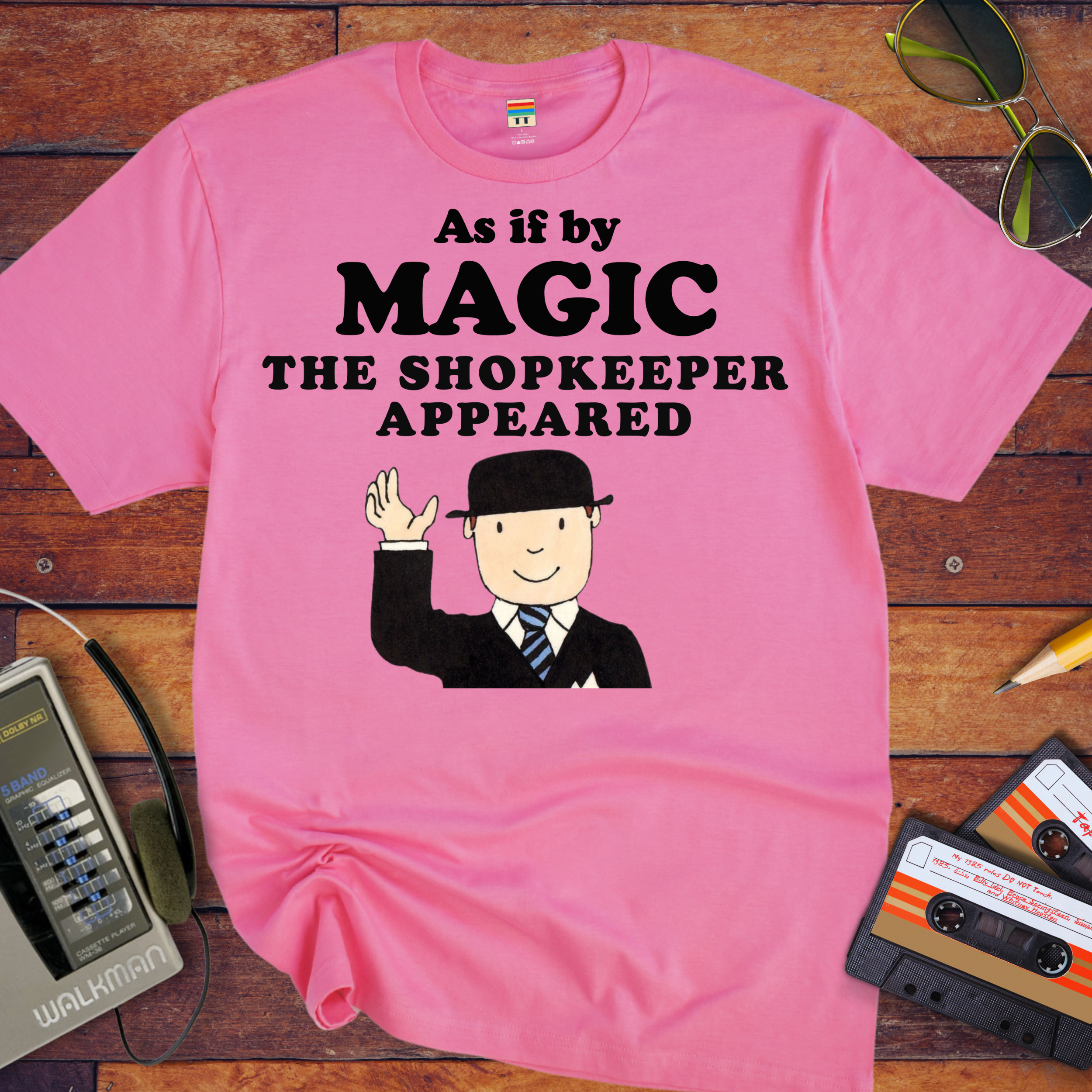 'As if by MAGIC THE SHOPKEEPER APPEARED' Funny T-Shirt
