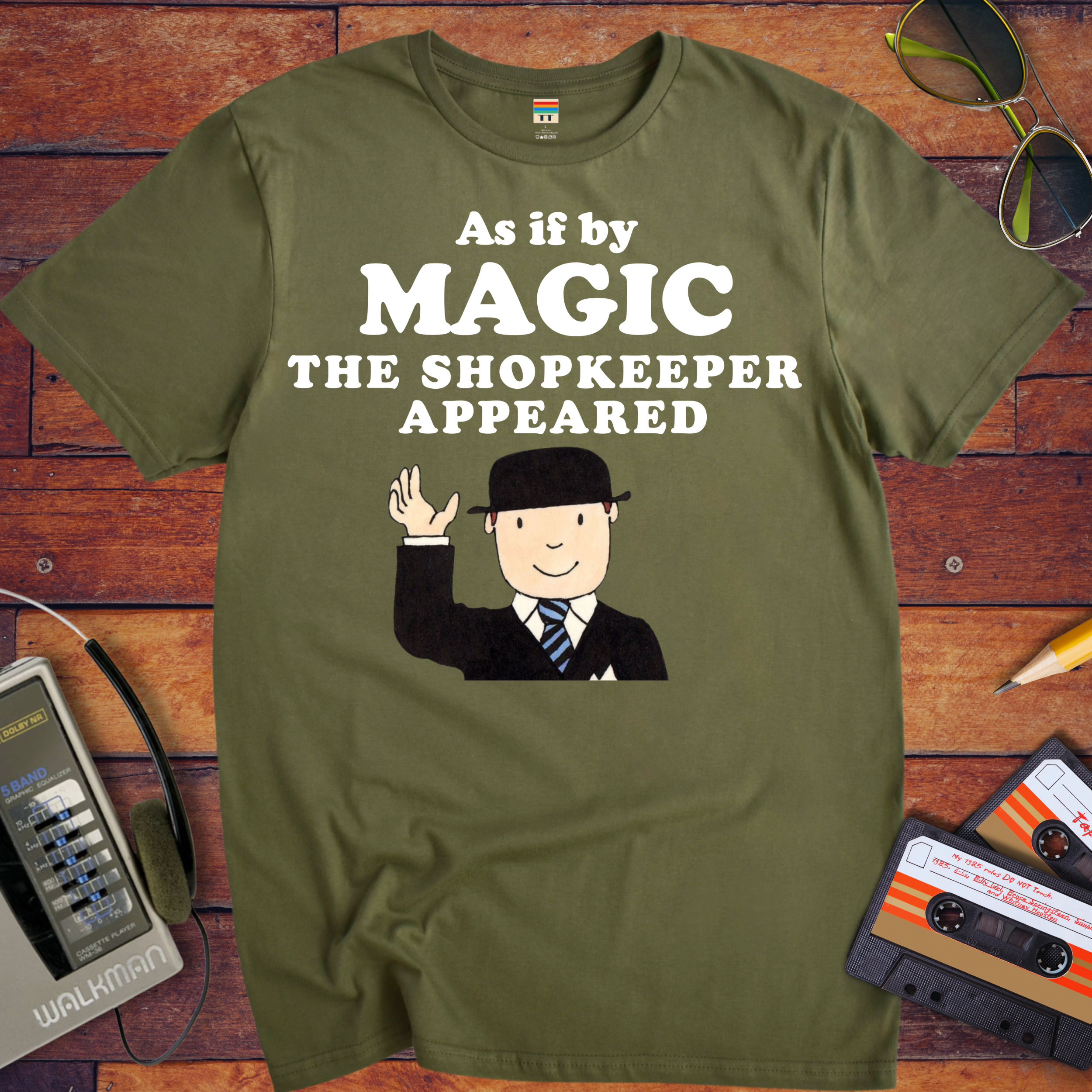 'As if by MAGIC THE SHOPKEEPER APPEARED' Funny T-Shirt