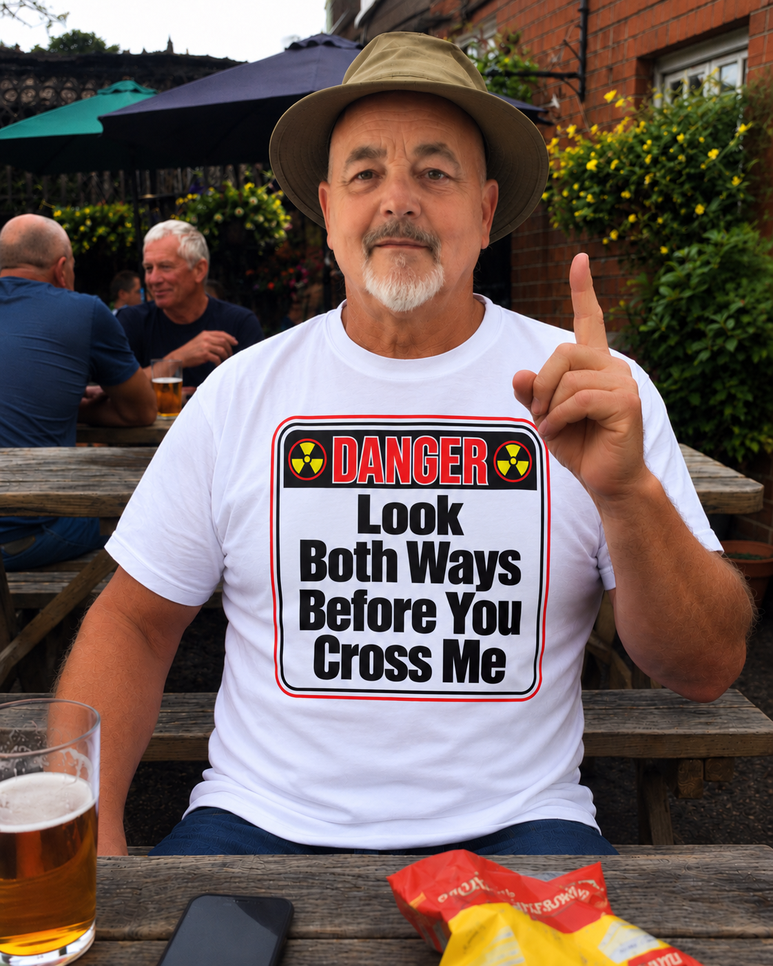 Model wearing white Look Both Ways Before You Cross Me T-shirt in pub garden