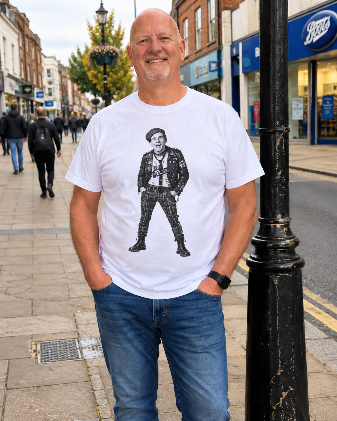 Customer-style street photo wearing white Norman Wisdom Punk T-shirt