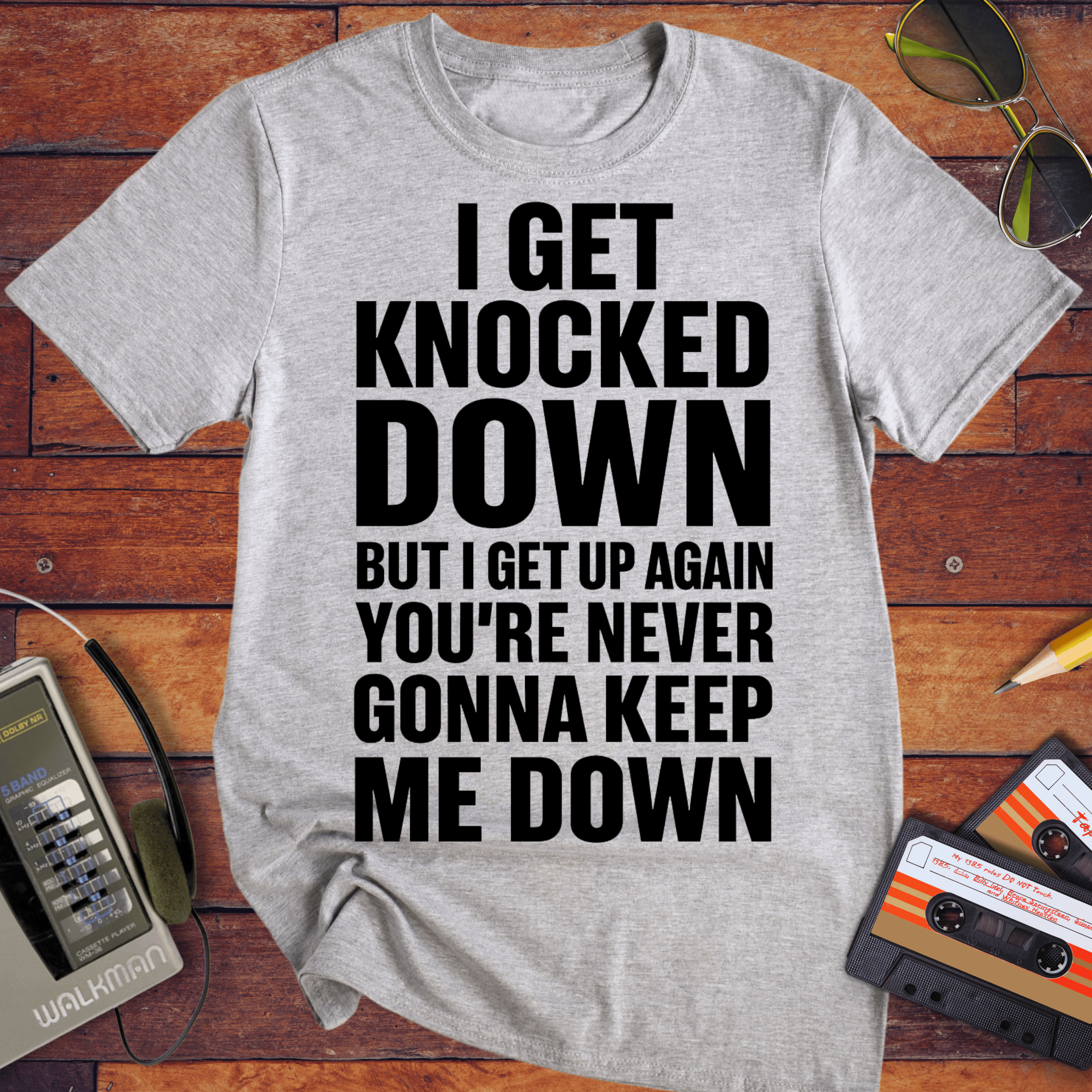 'I GET KNOCKED DOWN BUT I GET UP AGAIN YOU'RE NEVER GONNA KEEP ME DOWN' T-Shirt