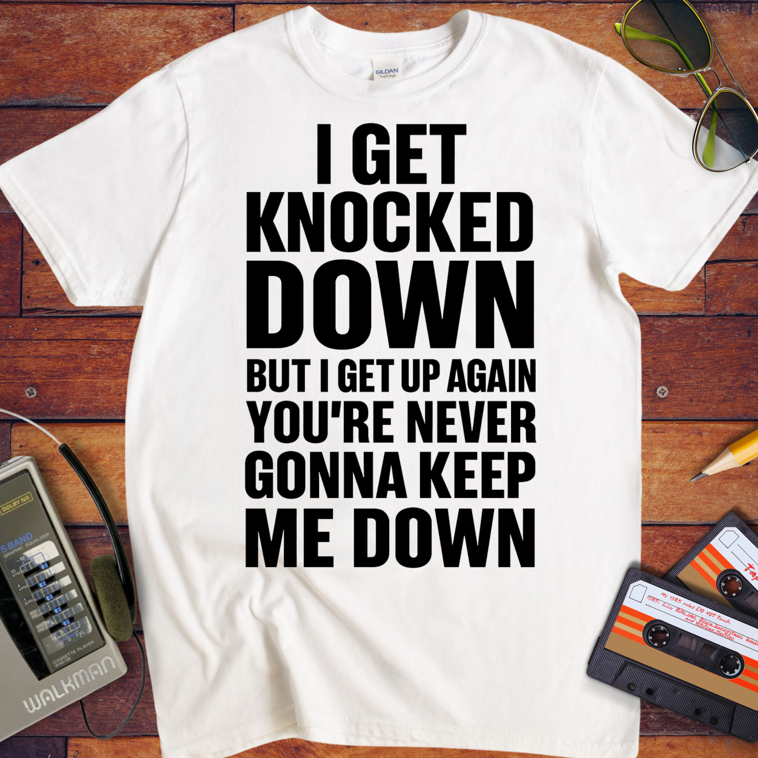 'I GET KNOCKED DOWN BUT I GET UP AGAIN YOU'RE NEVER GONNA KEEP ME DOWN' T-Shirt