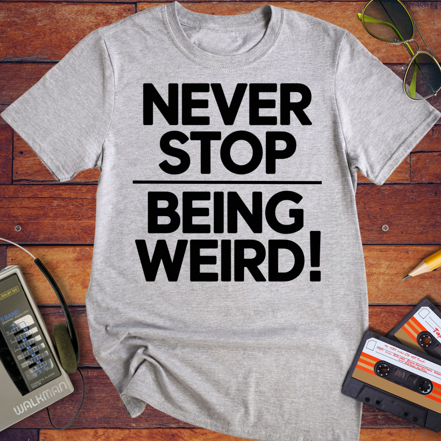 'NEVER STOP  BEING WEIRD' T-Shirt