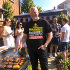 Man at garden barbecue wearing black Warning I'm Bored Things Could Get Dangerous T-shirt