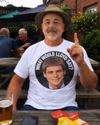 What Would Lloyd Say white T-shirt pub garden lifestyle image